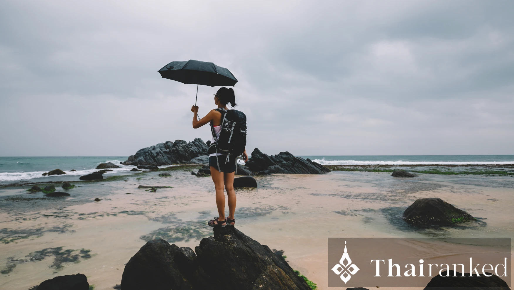 Packable rain jacket or travel umbrella